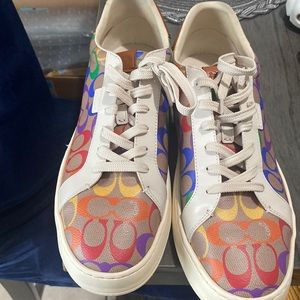 A pair of men authentic Coach shoes